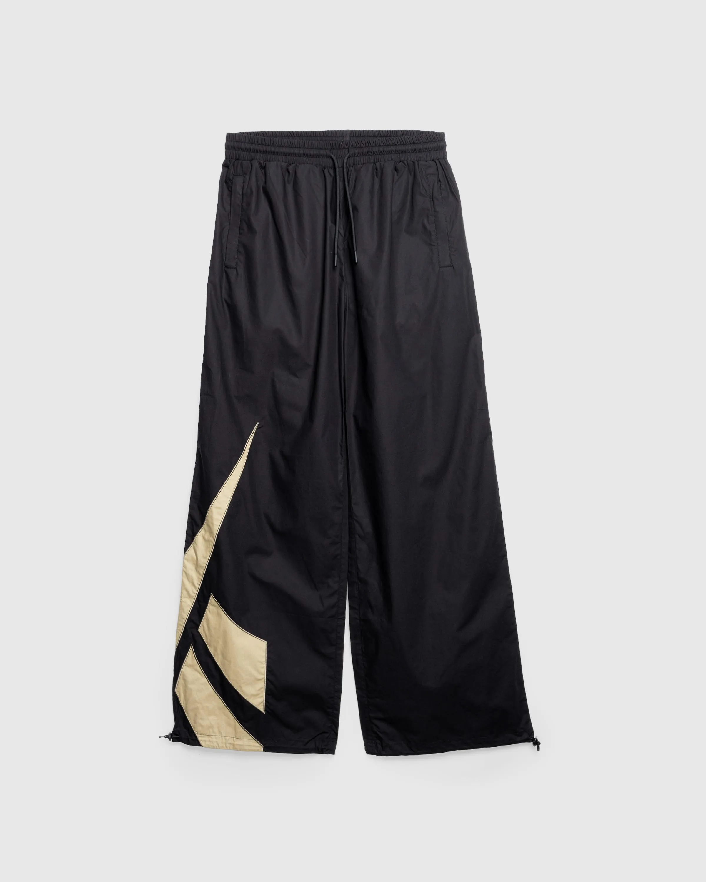 Reebok – Unisex Icon Remix Track Pant Black/Mocha | Highsnobiety Shop