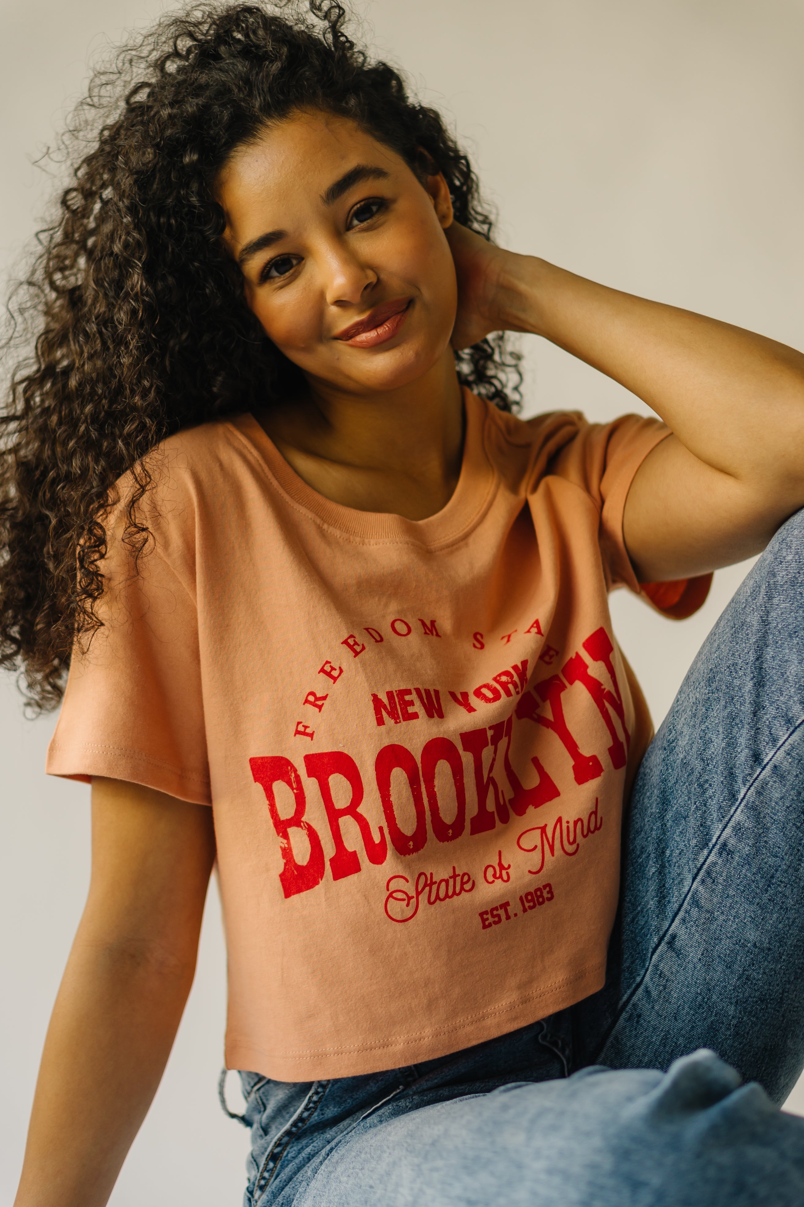 The NYC Freedom State Graphic Tee in Tan